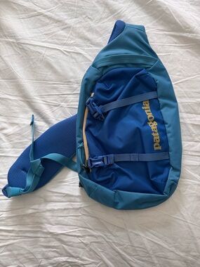 Patagonia Atom 8L sling bright blue backpack